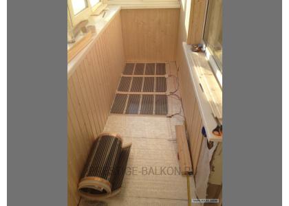 Теплое остекление лоджии пластиковыми окнами с теплым пленочным ИК полом в Москве