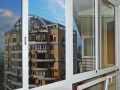 Алюминиевое раздвижное остекление балкона профилем Provedal и отделкой потолка вагонкой ПВХ в Москве